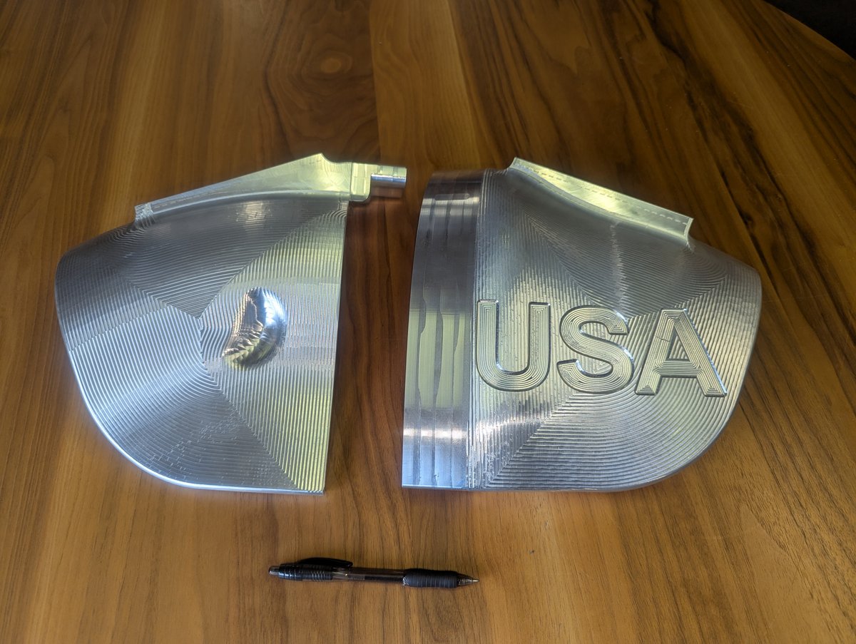 Large 3D contoured aluminum parts with USA engraving, CNC milled at Intrawest Machine and Fabricating